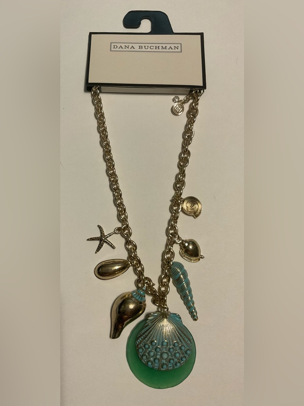 Dana Buchman Gold Tone Sea Life Charm Necklace Green Round, Signed, 20 in.
